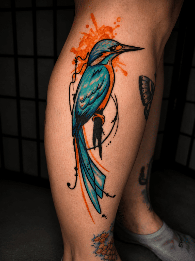 Colorful watercolor kingfisher tattoo by Jasmine at Broken Clover Tattoo in Tucson