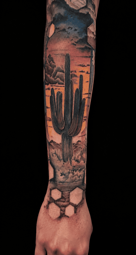 Color saguaro cactus and Arizona sunset forearm tattoo by Jinx at Broken Clover Tattoo in Tucson