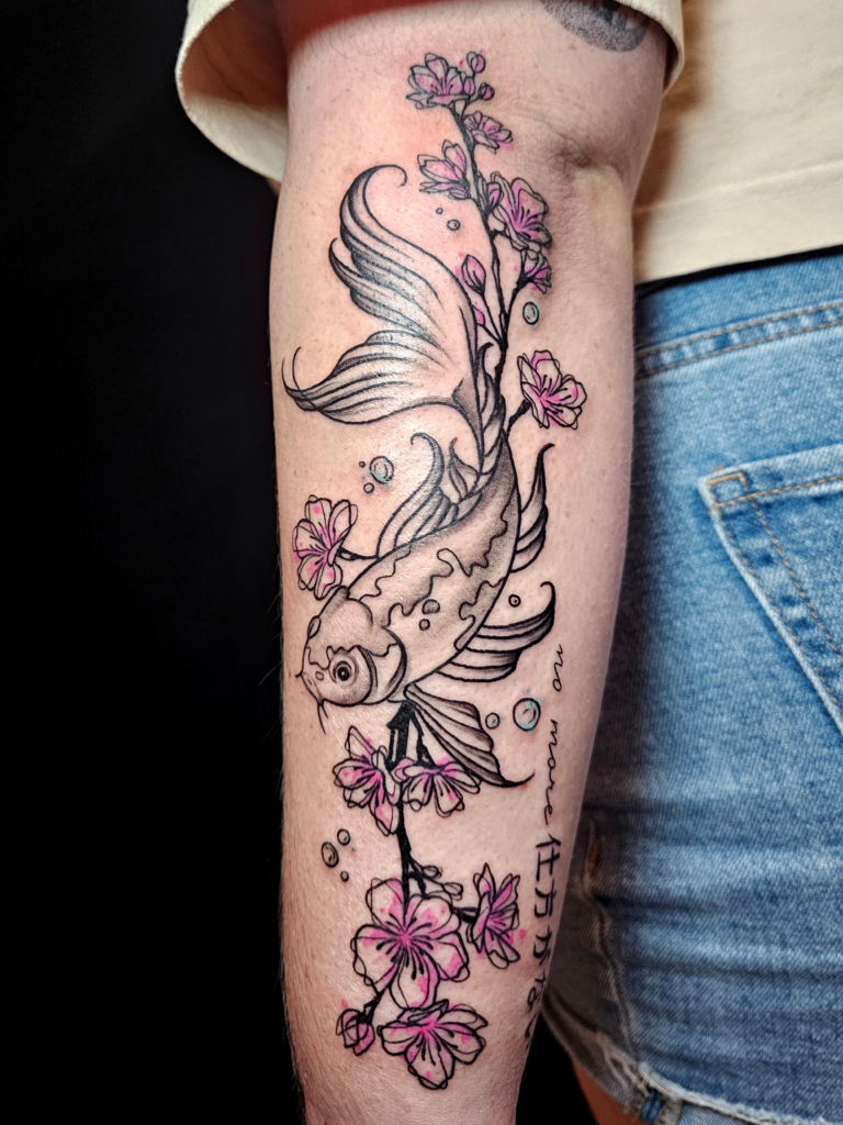 Koi and cherry blossom tattoo with watercolor accents