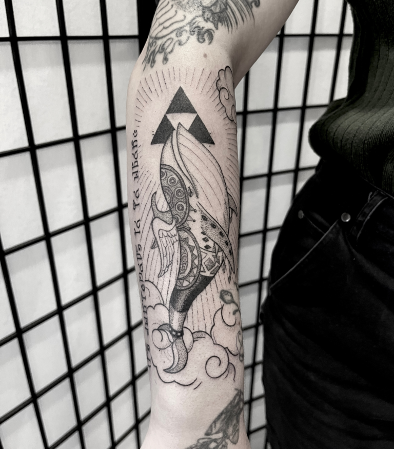 Windfish from Zelda, with a Triforce and hyrulian script