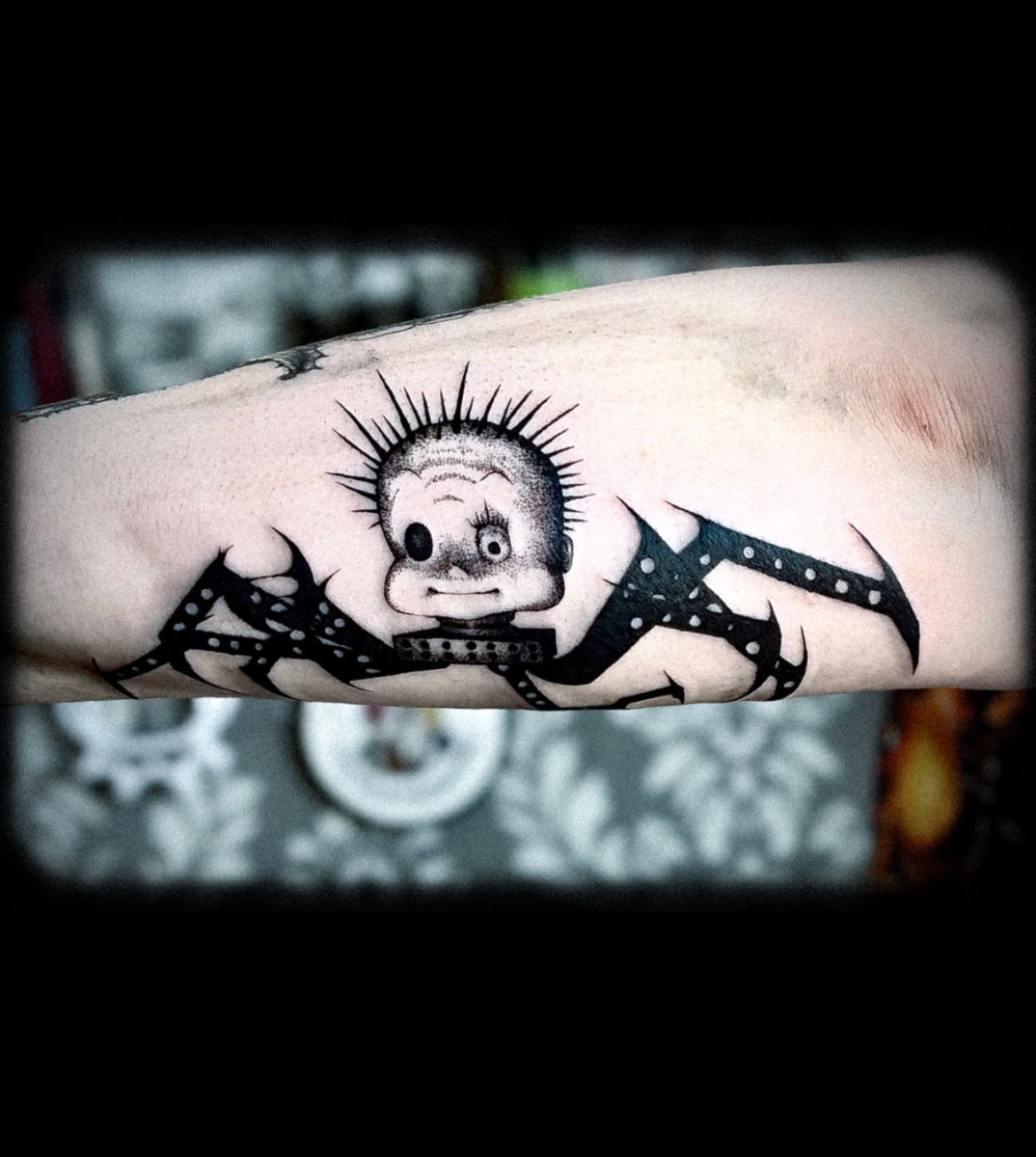 Dark illustrative Spider-Baby tattoo with spikes and dotwork by Dio at Broken Clover Tattoo in Tucson
