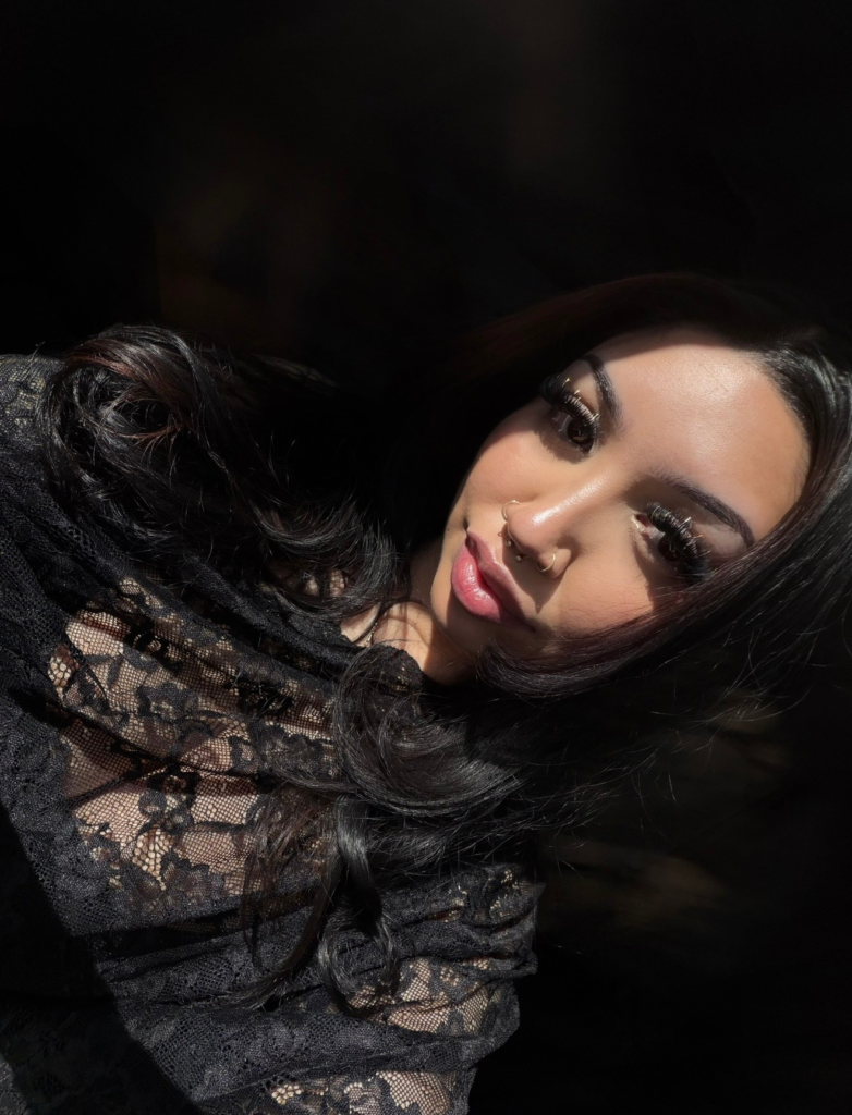 Portrait of Angelica, tattoo artist at Broken Clover Tattoo in Tucson.