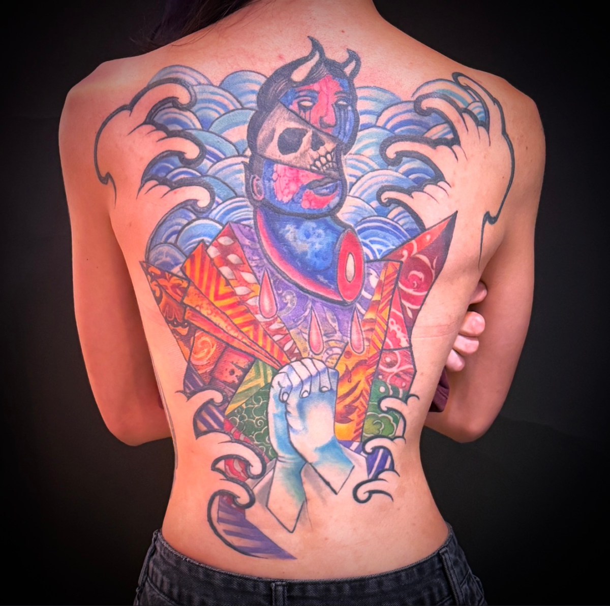 Large-scale cubist back piece tattoo by Jinx at Broken Clover Tattoo in Tucson