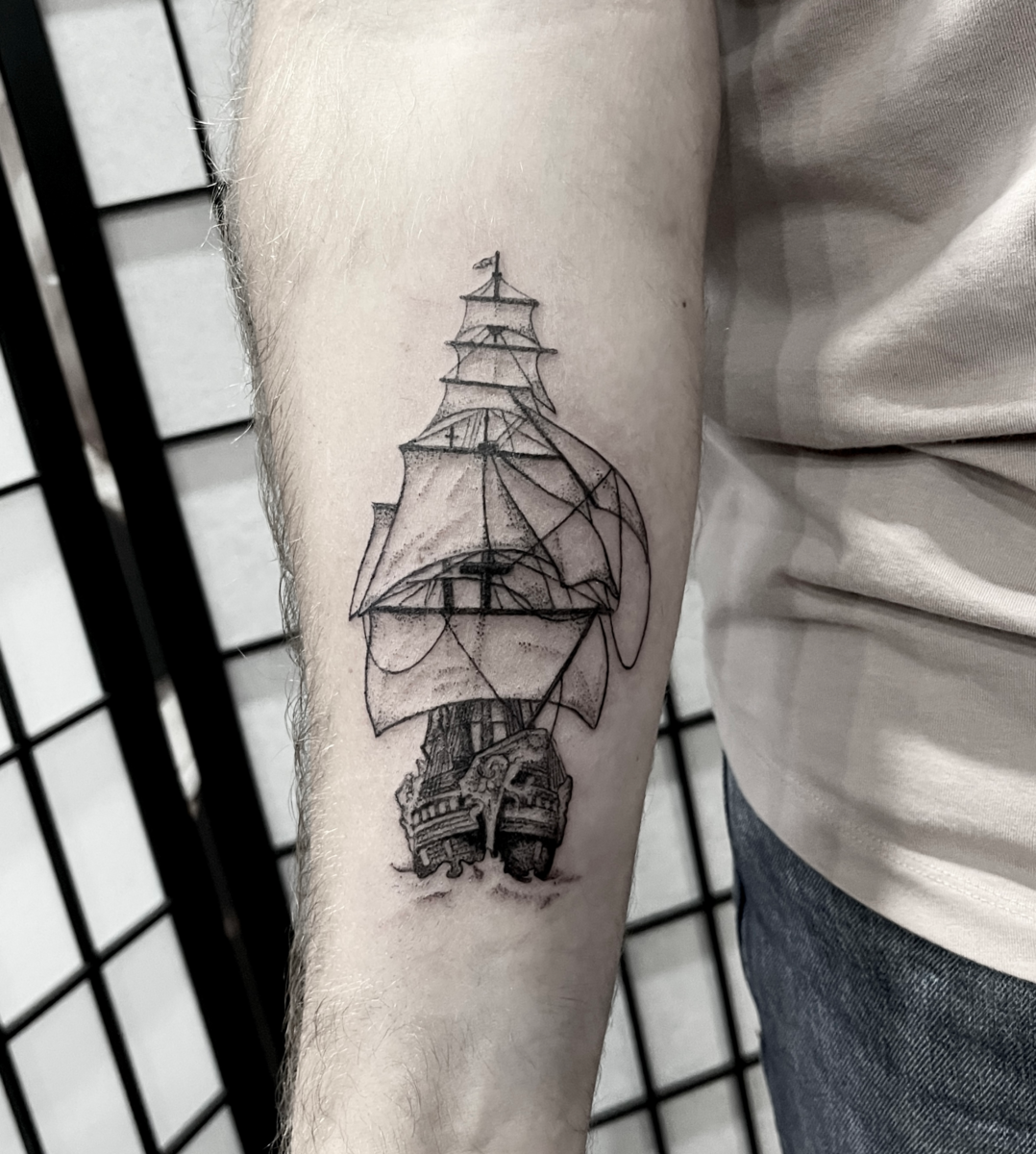 Blackwork pirate ship tattoo by Danae at Broken Clover Tattoo in Tucson