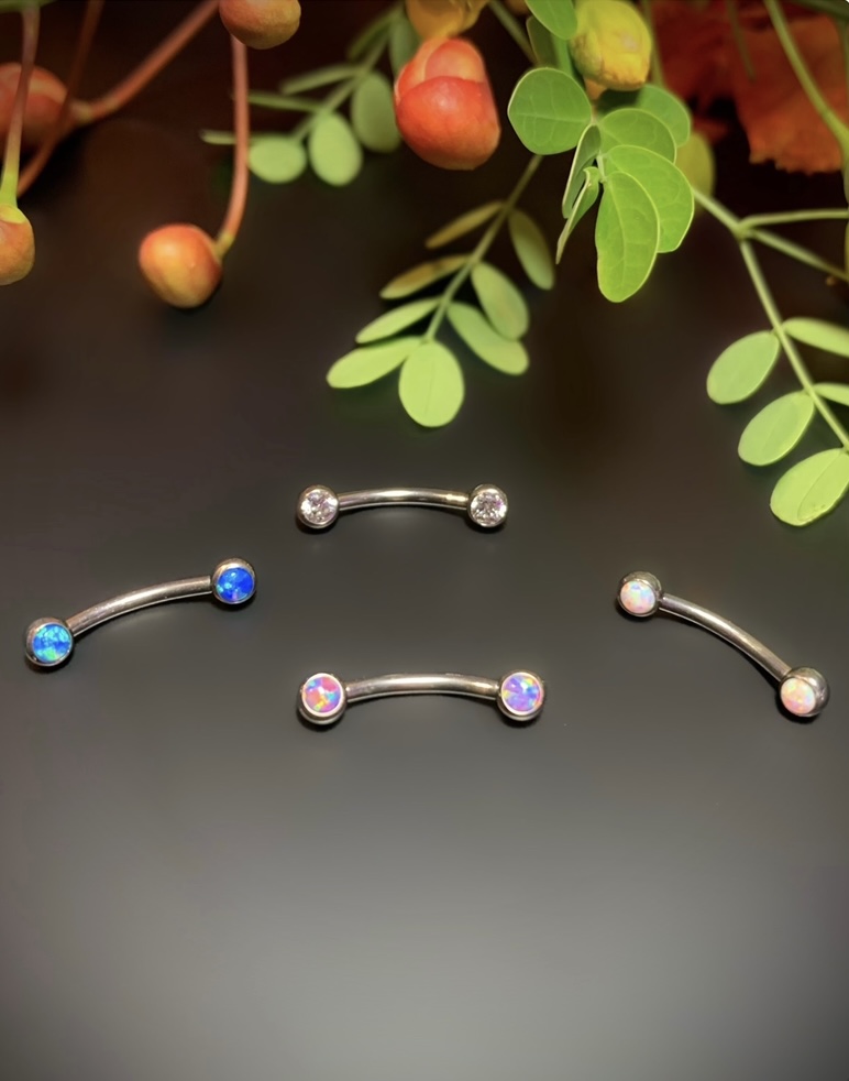 Four Opal curved barbells